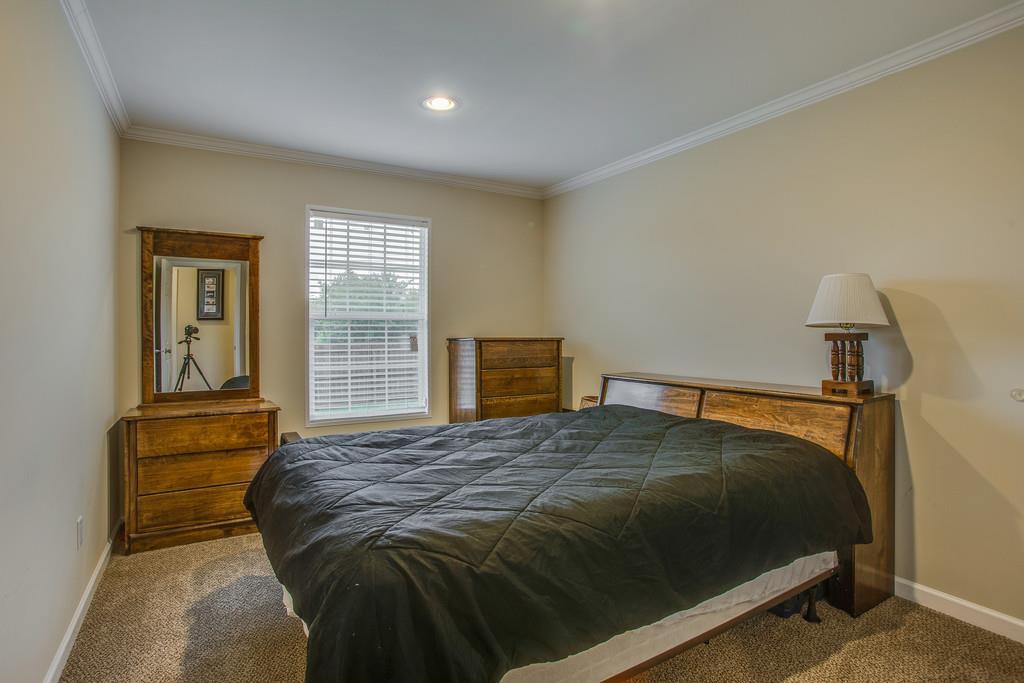 1142 Wrights Mill Road Spring Hill, TN 37174 - Photo 22 of 30 a bedroom with a bed and window