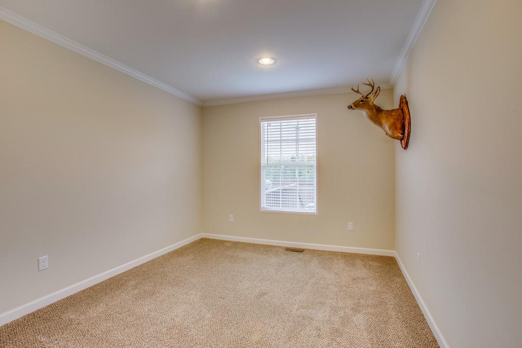 1142 Wrights Mill Road Spring Hill, TN 37174 - Photo 24 of 30 an empty room with windows