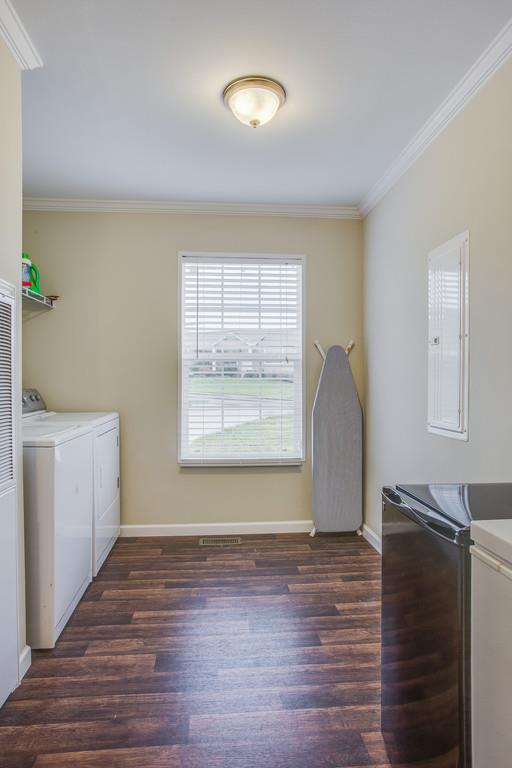 1142 Wrights Mill Road Spring Hill, TN 37174 - Photo 25 of 30 a view of a room with wooden floor and cabinet