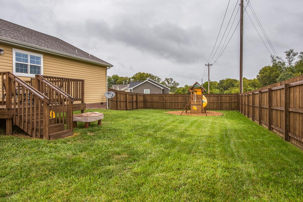 1142 Wrights Mill Road Spring Hill, TN 37174 - Photo 30 of 30 a view of a house with a yard and sitting area