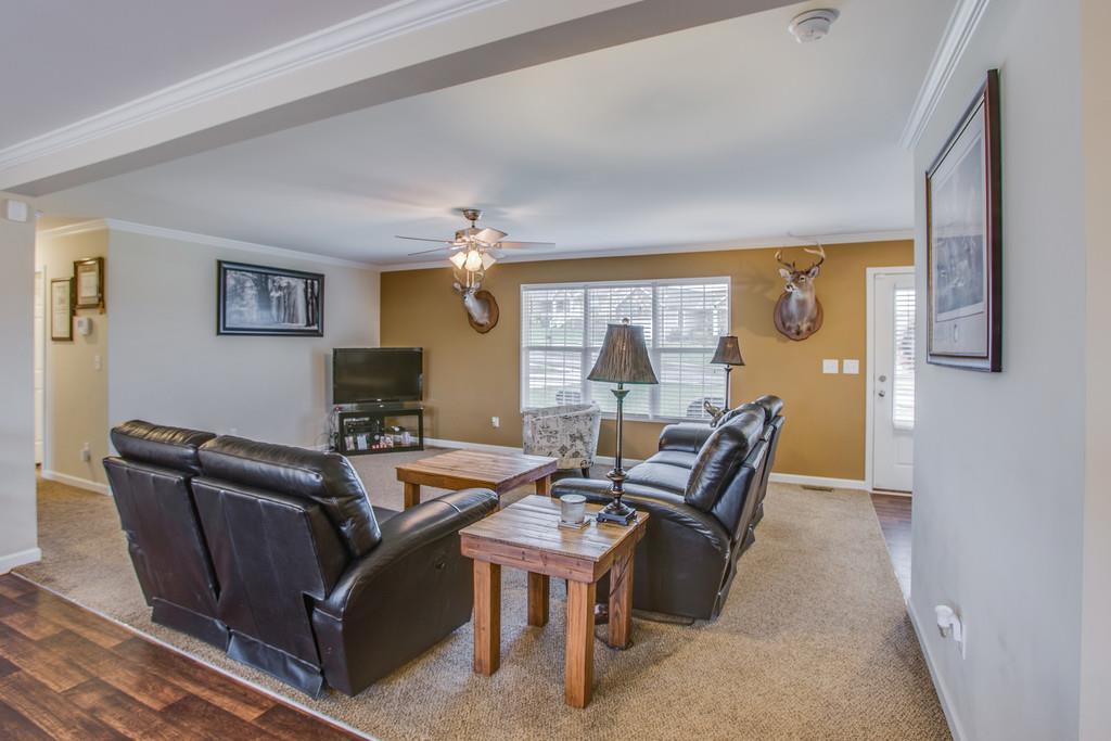 1142 Wrights Mill Road Spring Hill, TN 37174 - Photo 6 of 30 a living room with furniture and wooden floor