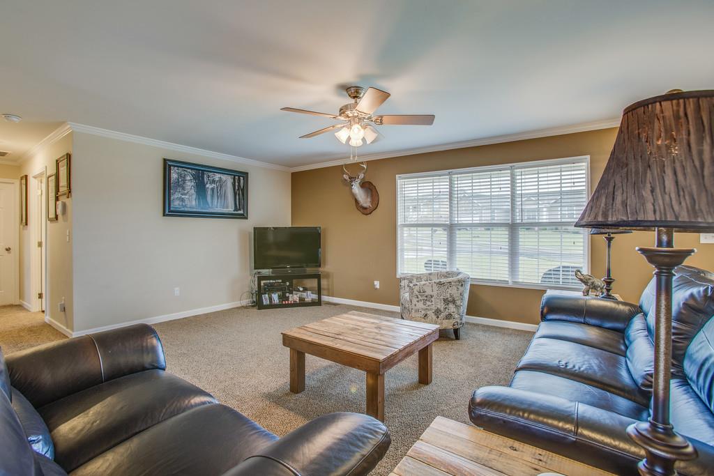 1142 Wrights Mill Road Spring Hill, TN 37174 - Photo 7 of 30 a living room with furniture and a large window