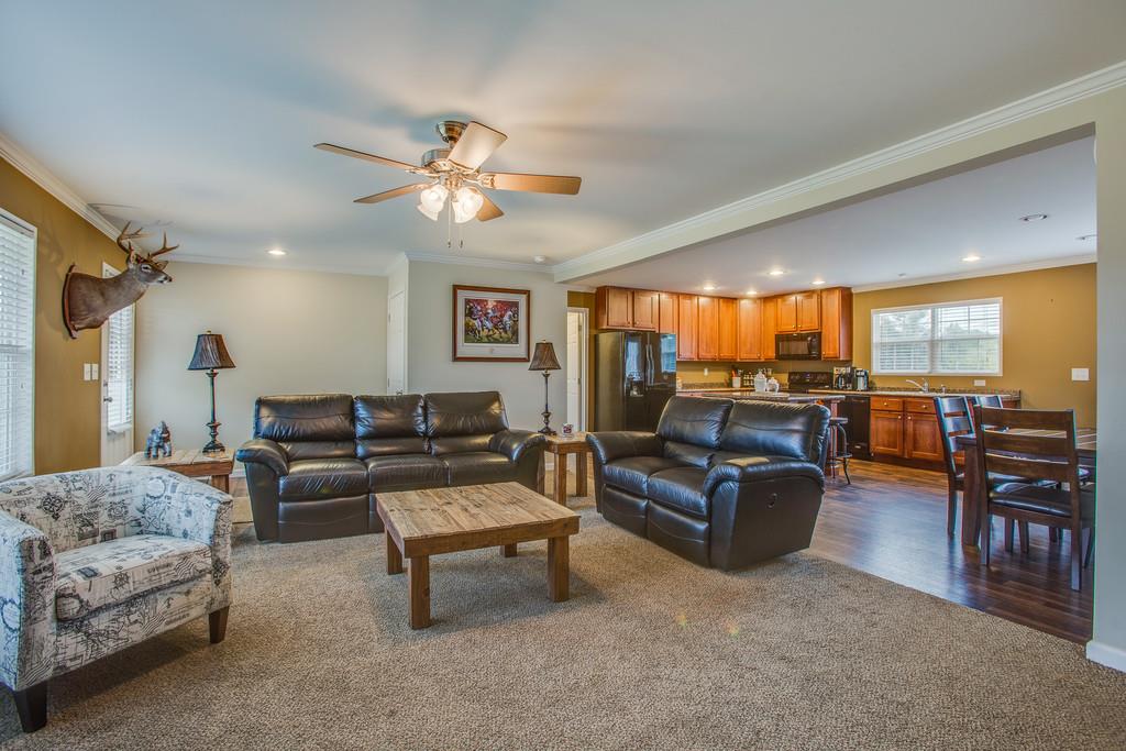 1142 Wrights Mill Road Spring Hill, TN 37174 - Photo 9 of 30 a living room with furniture and a large window