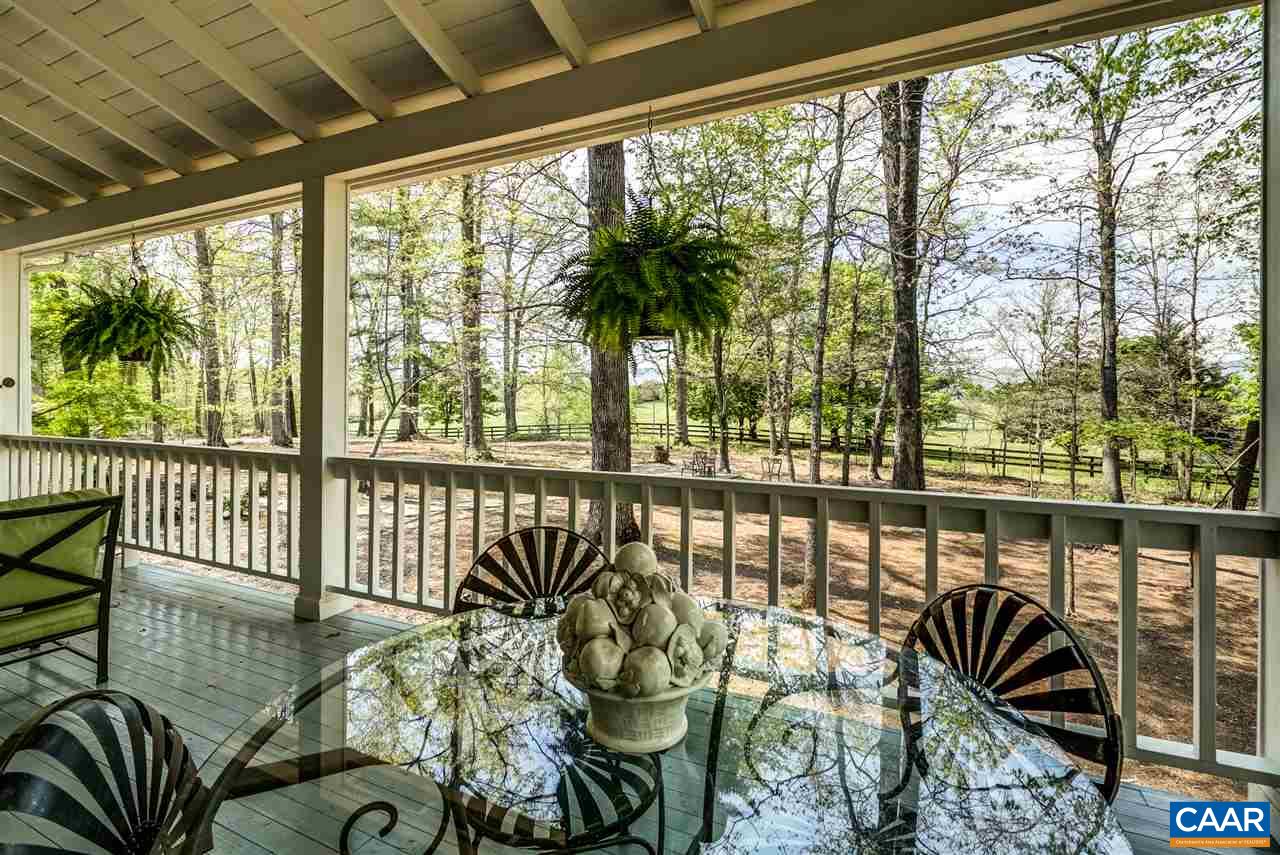 2845 Ridge Road Charlottesville, VA 22901 - Photo 11 of 50 a view of a balcony and mountain with furniture