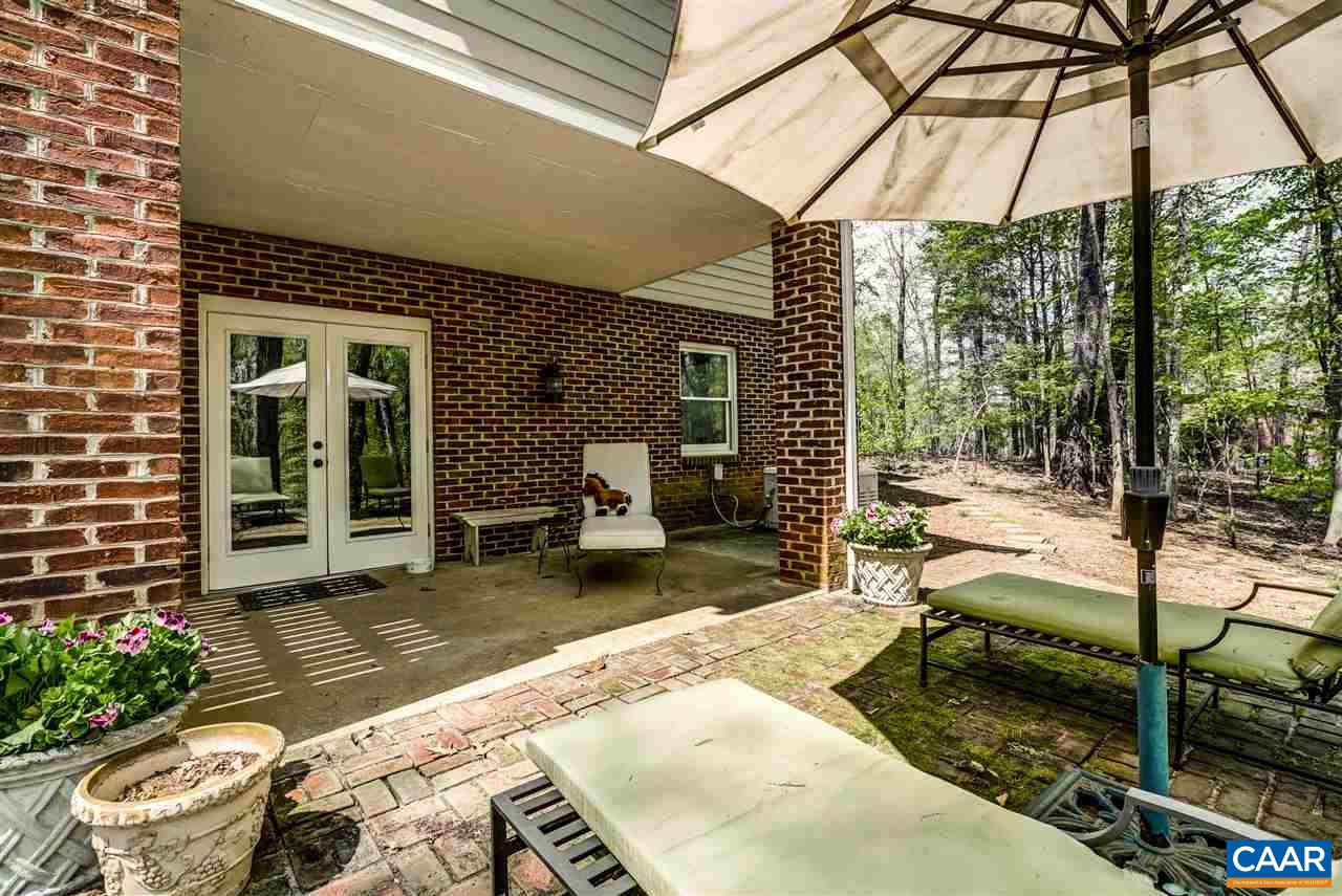 2845 Ridge Road Charlottesville, VA 22901 - Photo 13 of 50 a view of a chair and tables in the patio