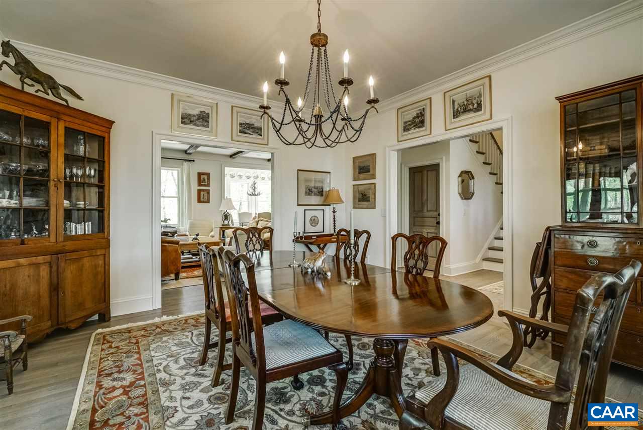 2845 Ridge Road Charlottesville, VA 22901 - Photo 19 of 50 a view of a dining room with furniture and chandelier