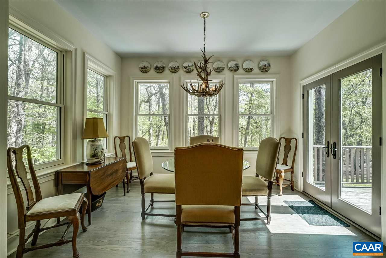 2845 Ridge Road Charlottesville, VA 22901 - Photo 26 of 50 a view of a dining room with furniture window and outside view