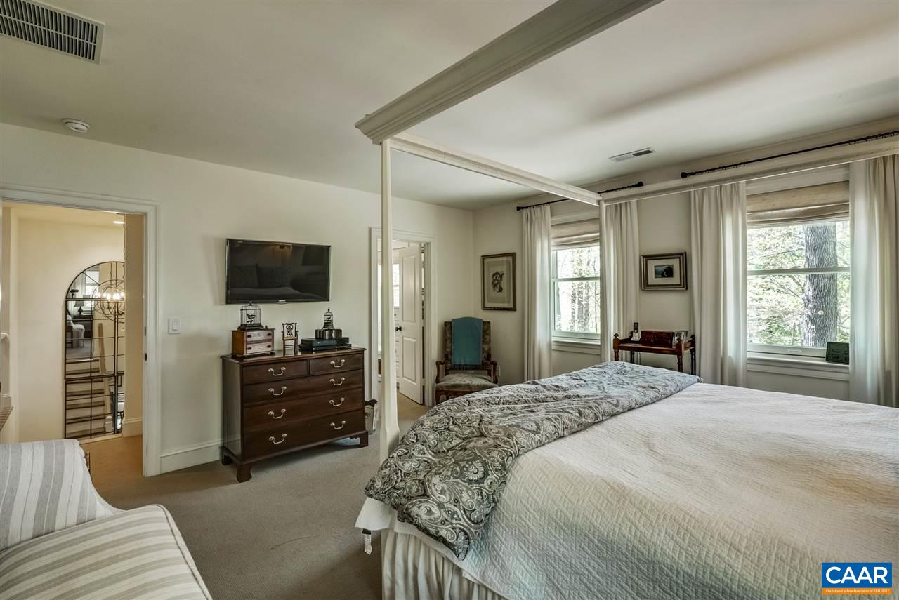 2845 Ridge Road Charlottesville, VA 22901 - Photo 35 of 50 a bedroom with a bed and a flat screen tv
