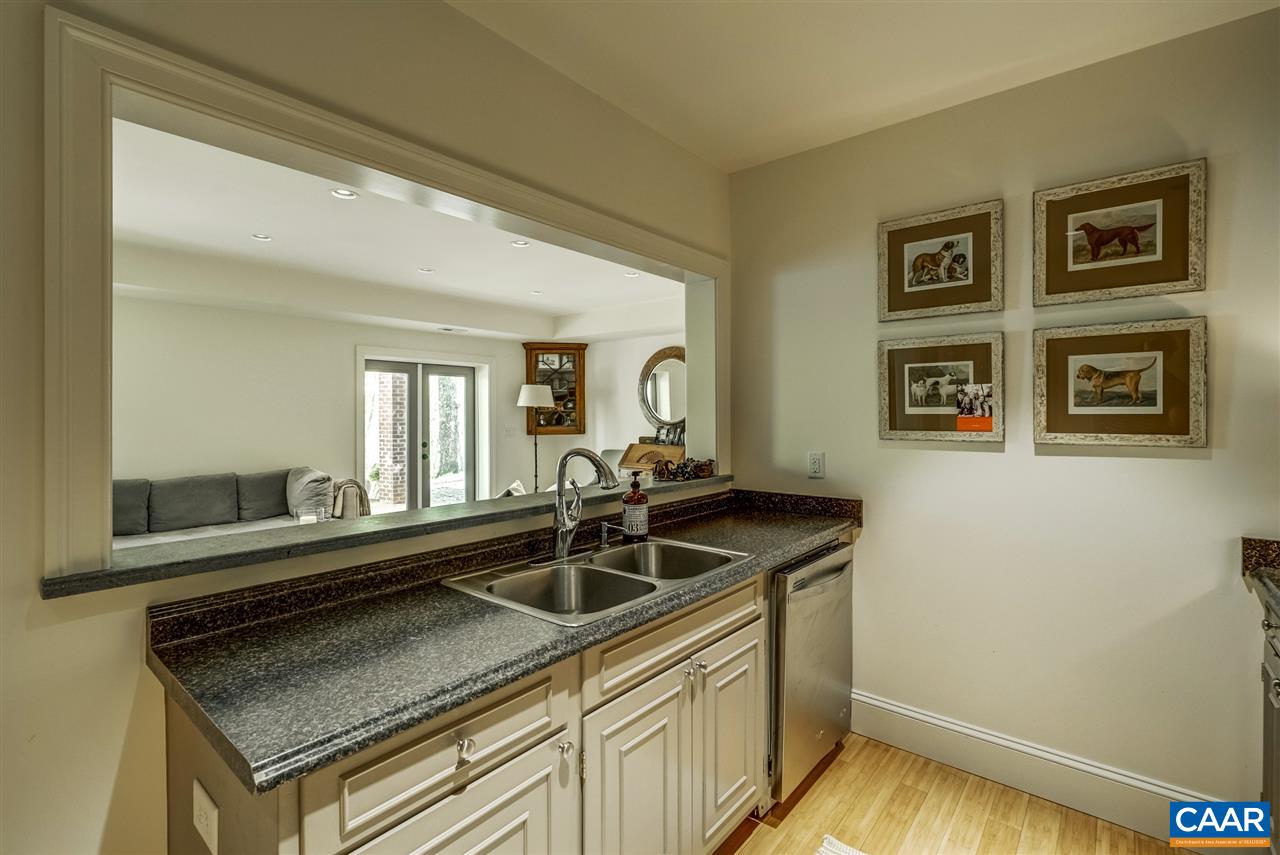 2845 Ridge Road Charlottesville, VA 22901 - Photo 48 of 50 a kitchen with a sink and cabinets