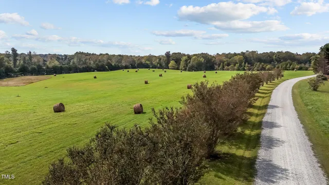 a view of a golf course with a lake view