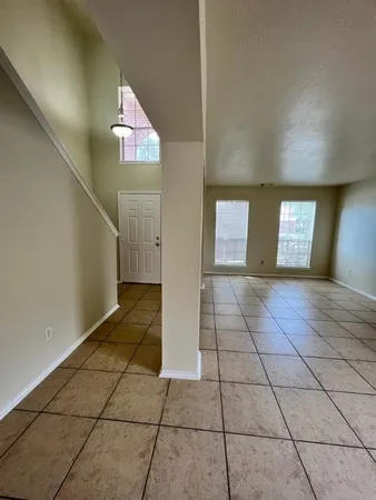 a view of an entryway and a hallway