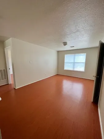 an empty room with a window