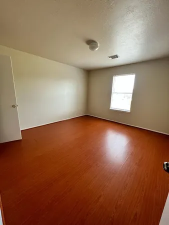 an empty room with a window