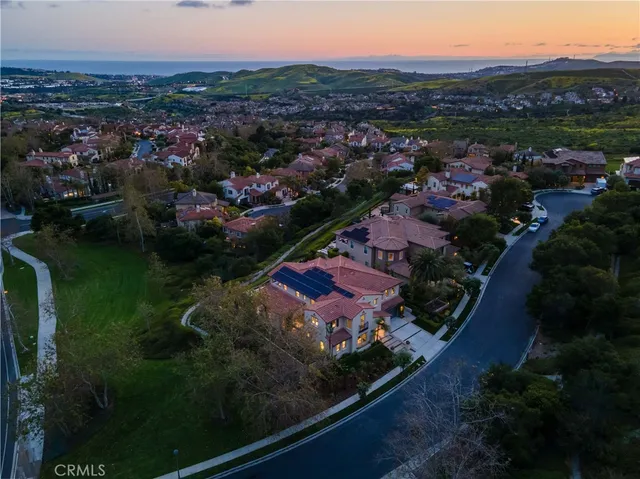 a view of a building with car parked