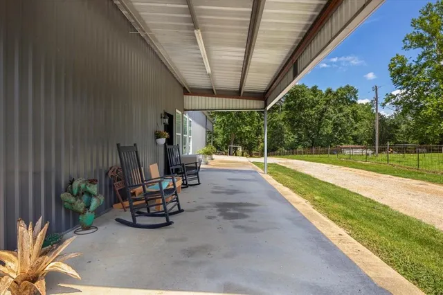 a view of a house with a yard and garage