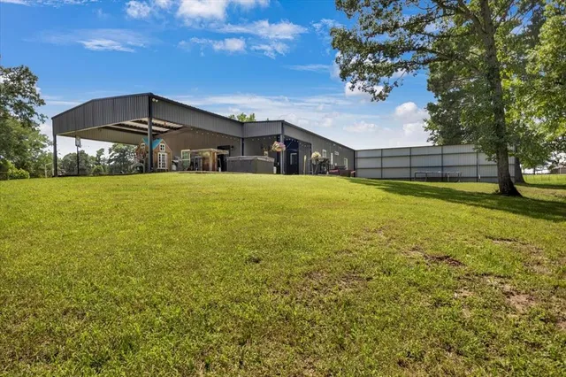 a view of a swimming pool with a patio