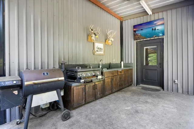 a view of a lake with a yard