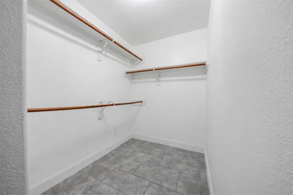 a view of an empty walk in closet