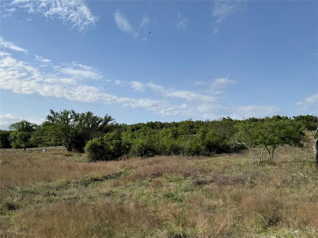 21 Indian Spring Hamilton, TX 76531 - Photo 8 of 19 a view of a lake with mountain in the back