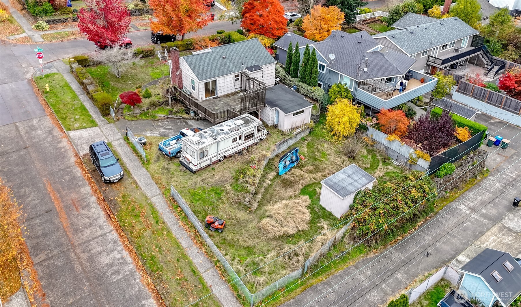an aerial view of a house with a swimming pool