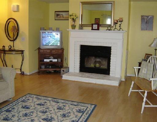 2 Edgehill Circle Monroe, CT 06468 - Photo 1 of 1 a living room with furniture and a fireplace