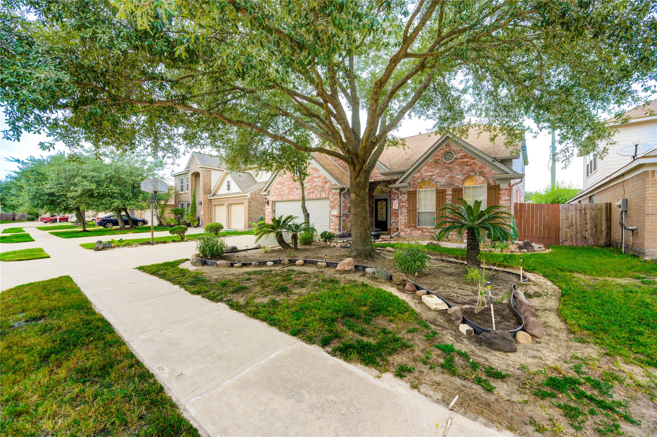 16730 Spring Barker Drive Cypress, TX 77429 - Photo 8 of 50 a view of a house with a yard and pathway