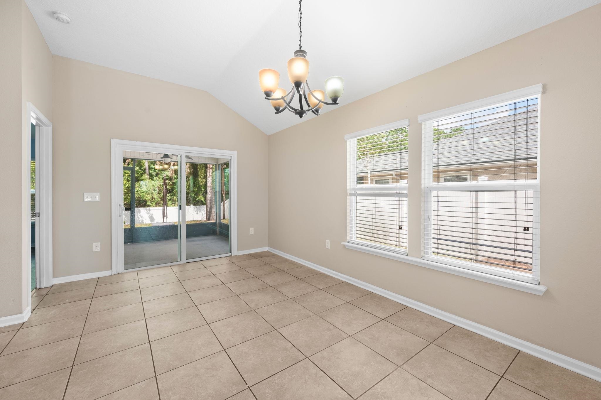 509 Deer Crossing Road St. Augustine, FL 32086 - Photo 11 of 54 a view of an empty room with a window