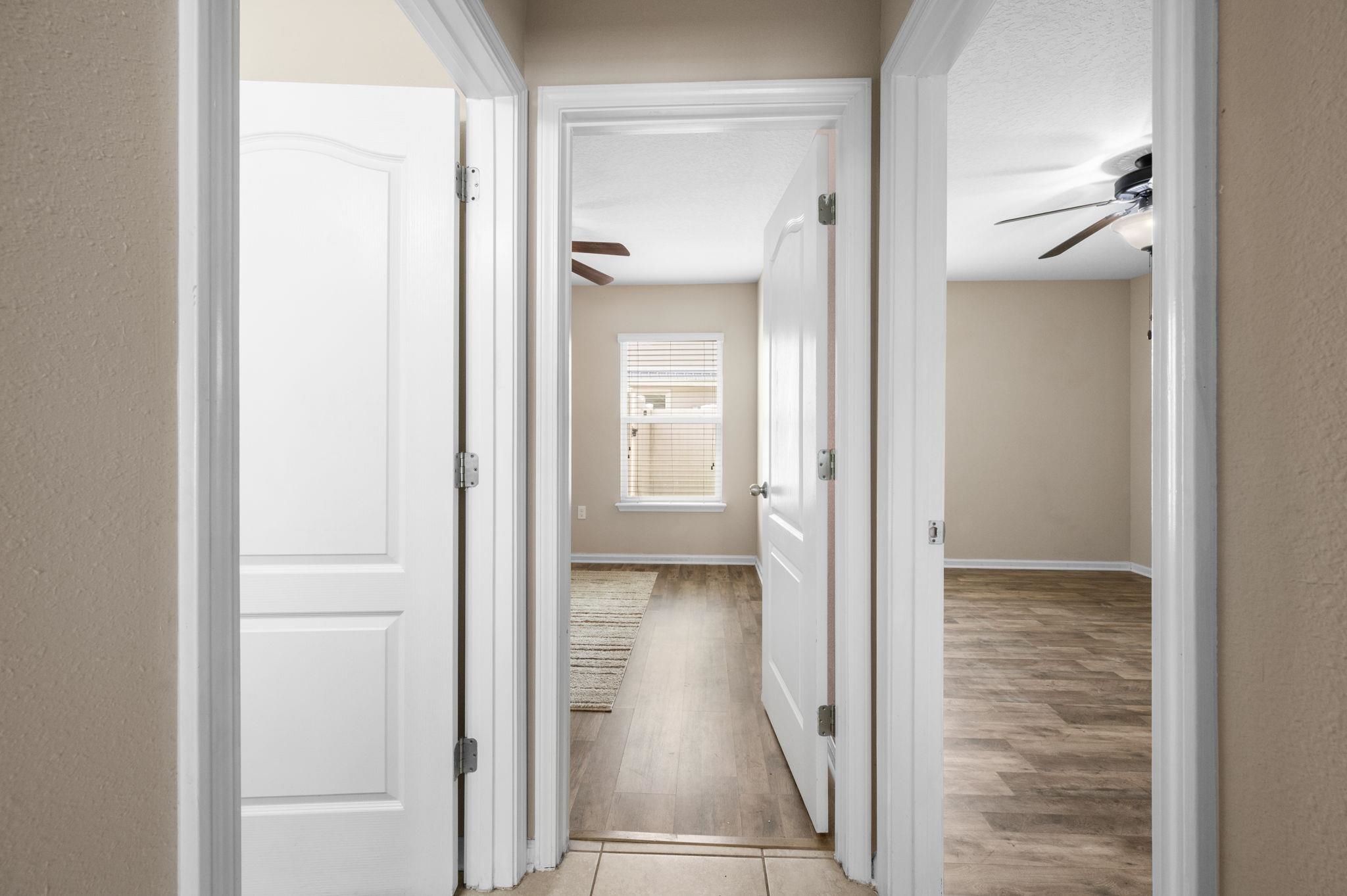 509 Deer Crossing Road St. Augustine, FL 32086 - Photo 26 of 54 a view of a bathroom from a corridor