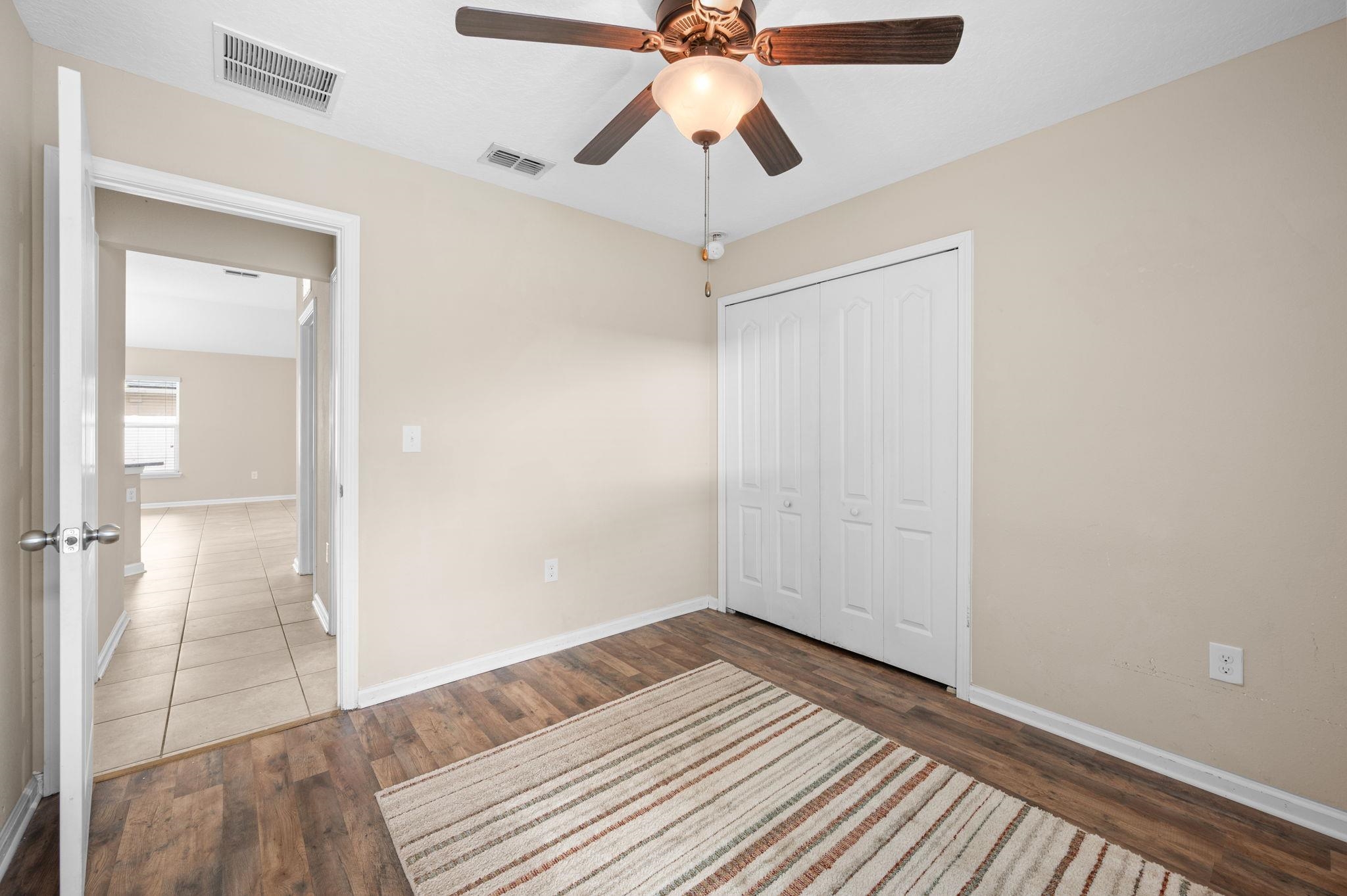 509 Deer Crossing Road St. Augustine, FL 32086 - Photo 28 of 54 a view of empty room with wooden floor