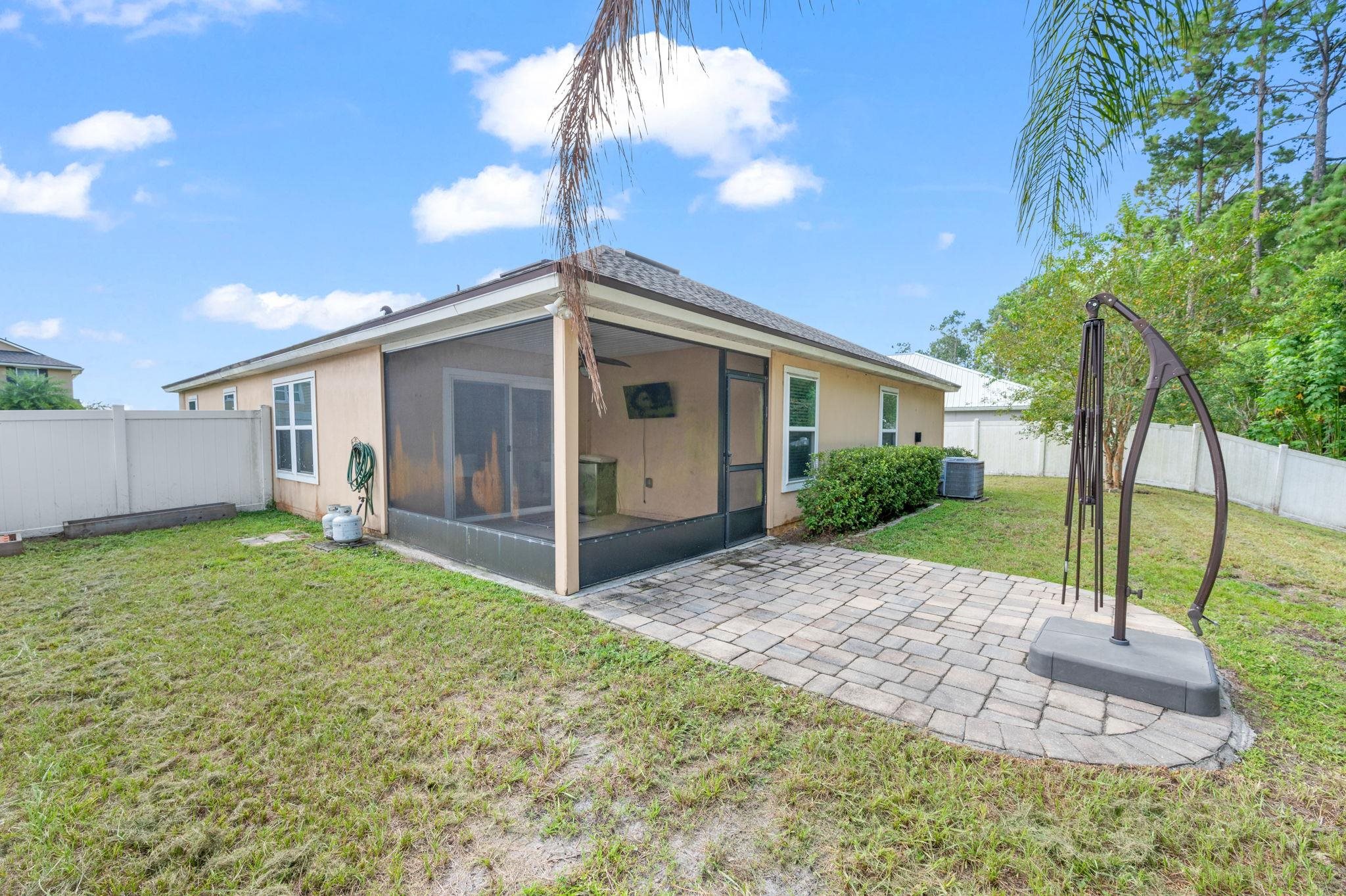 509 Deer Crossing Road St. Augustine, FL 32086 - Photo 36 of 54 a view of a house with backyard and porch