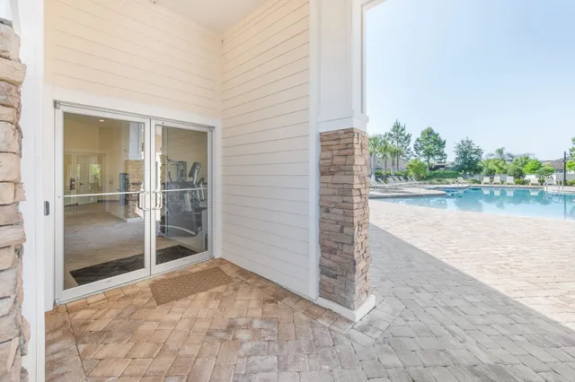 a view of a park with swings and slides