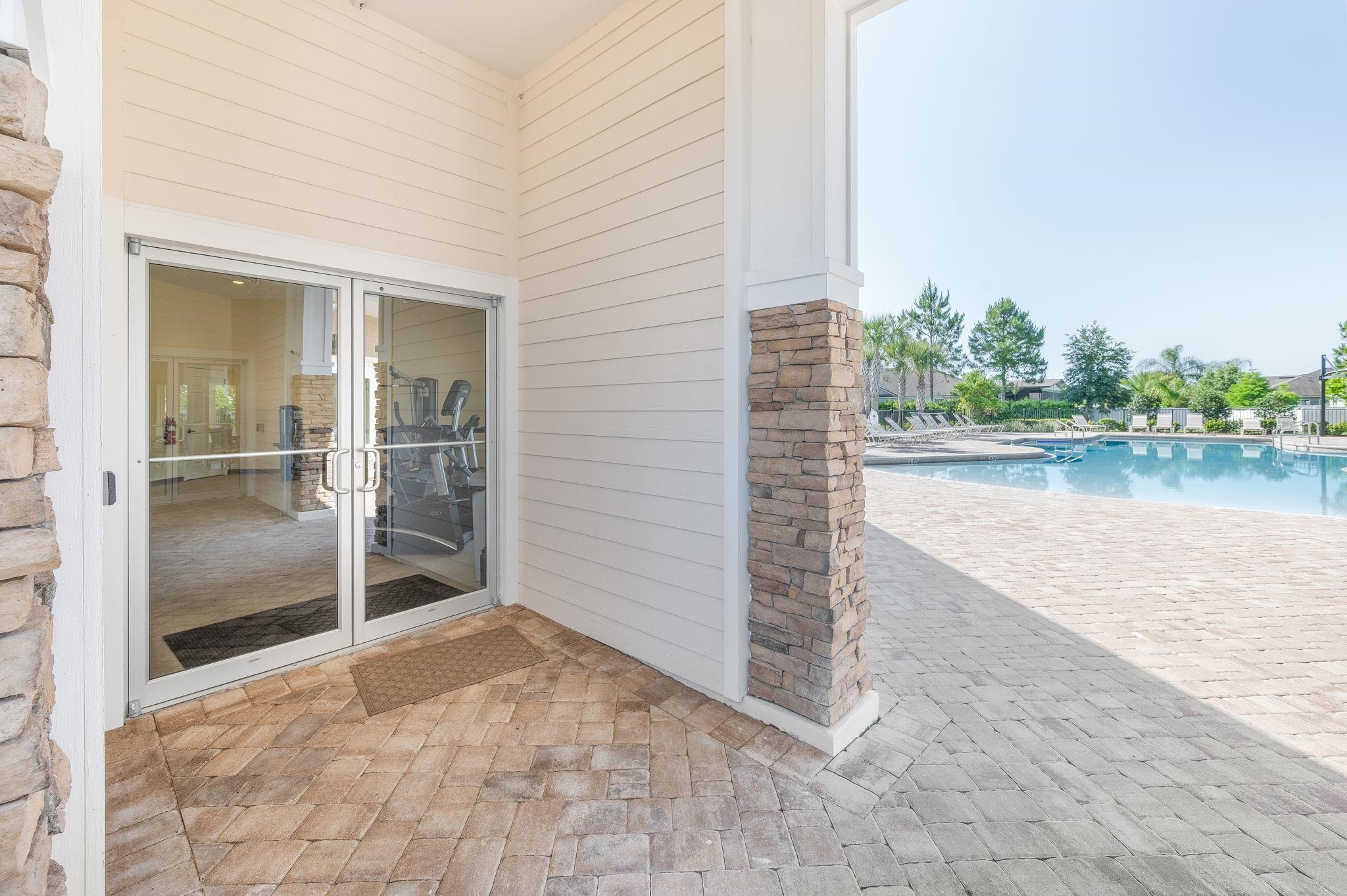 509 Deer Crossing Road St. Augustine, FL 32086 - Photo 47 of 54 View of patio / terrace with a community pool and french doors