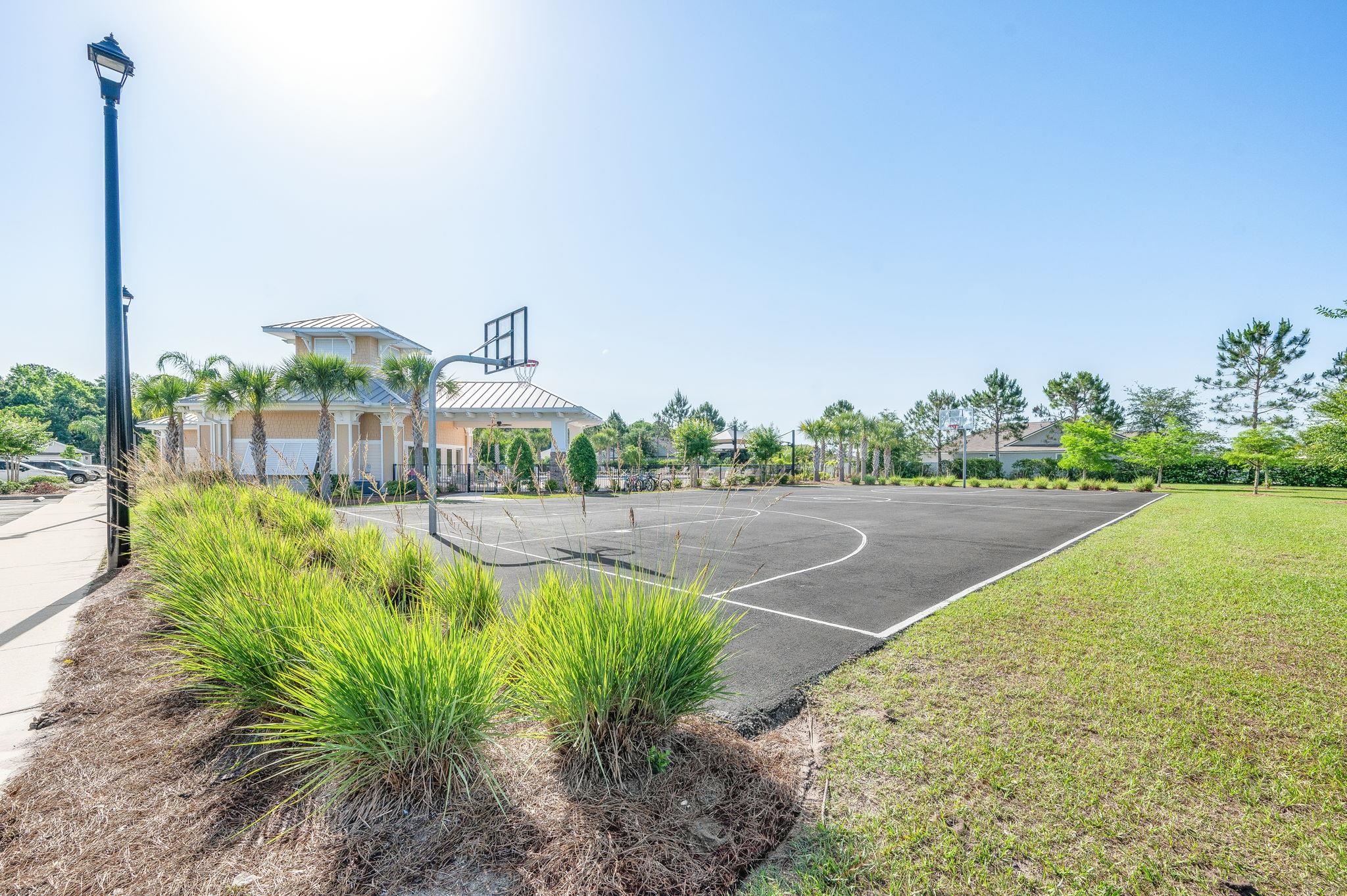 509 Deer Crossing Road St. Augustine, FL 32086 - Photo 53 of 54 a view of a swimming pool with a yard