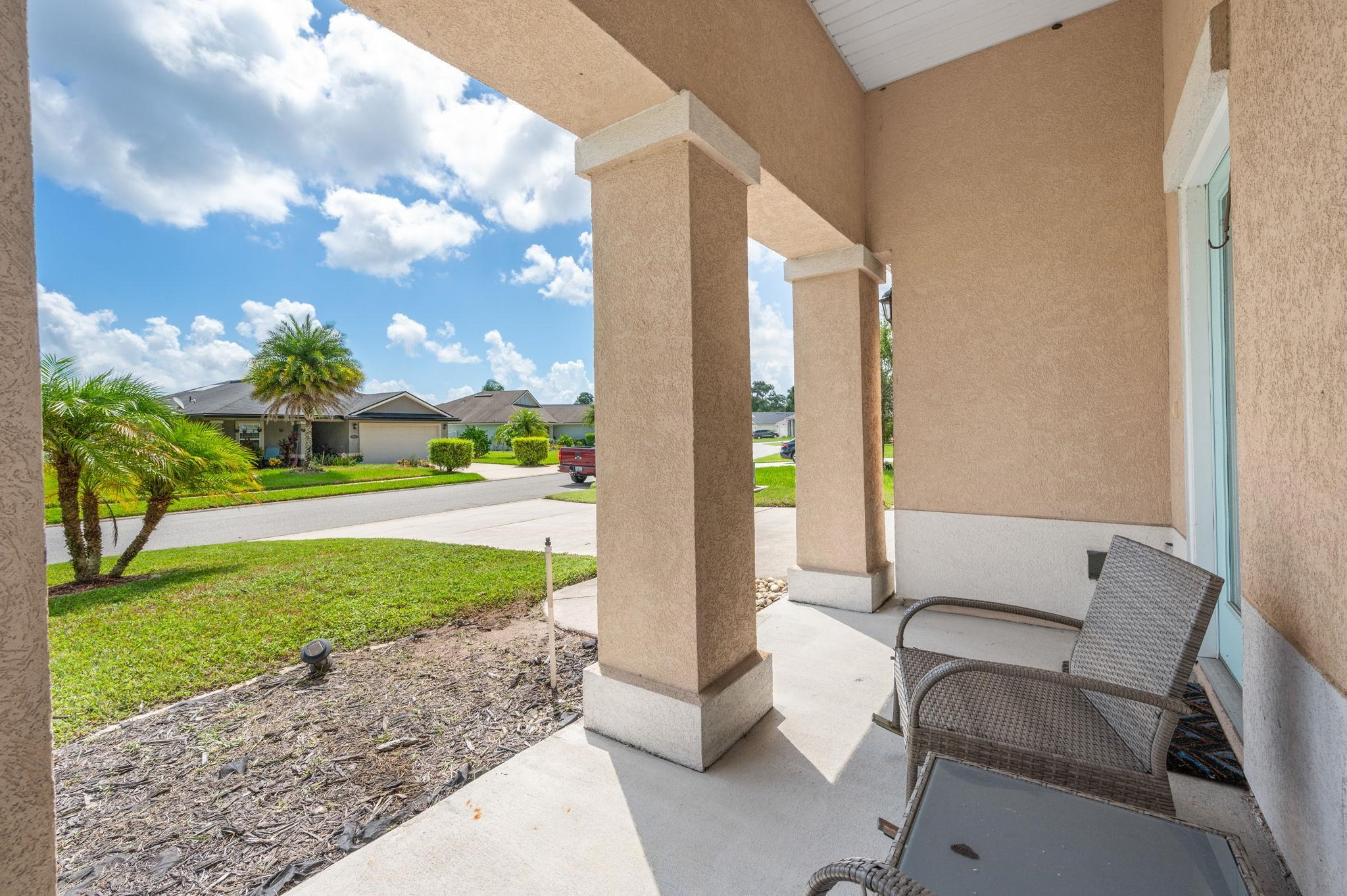 509 Deer Crossing Road St. Augustine, FL 32086 - Photo 6 of 54 a view of backyard with outdoor seating