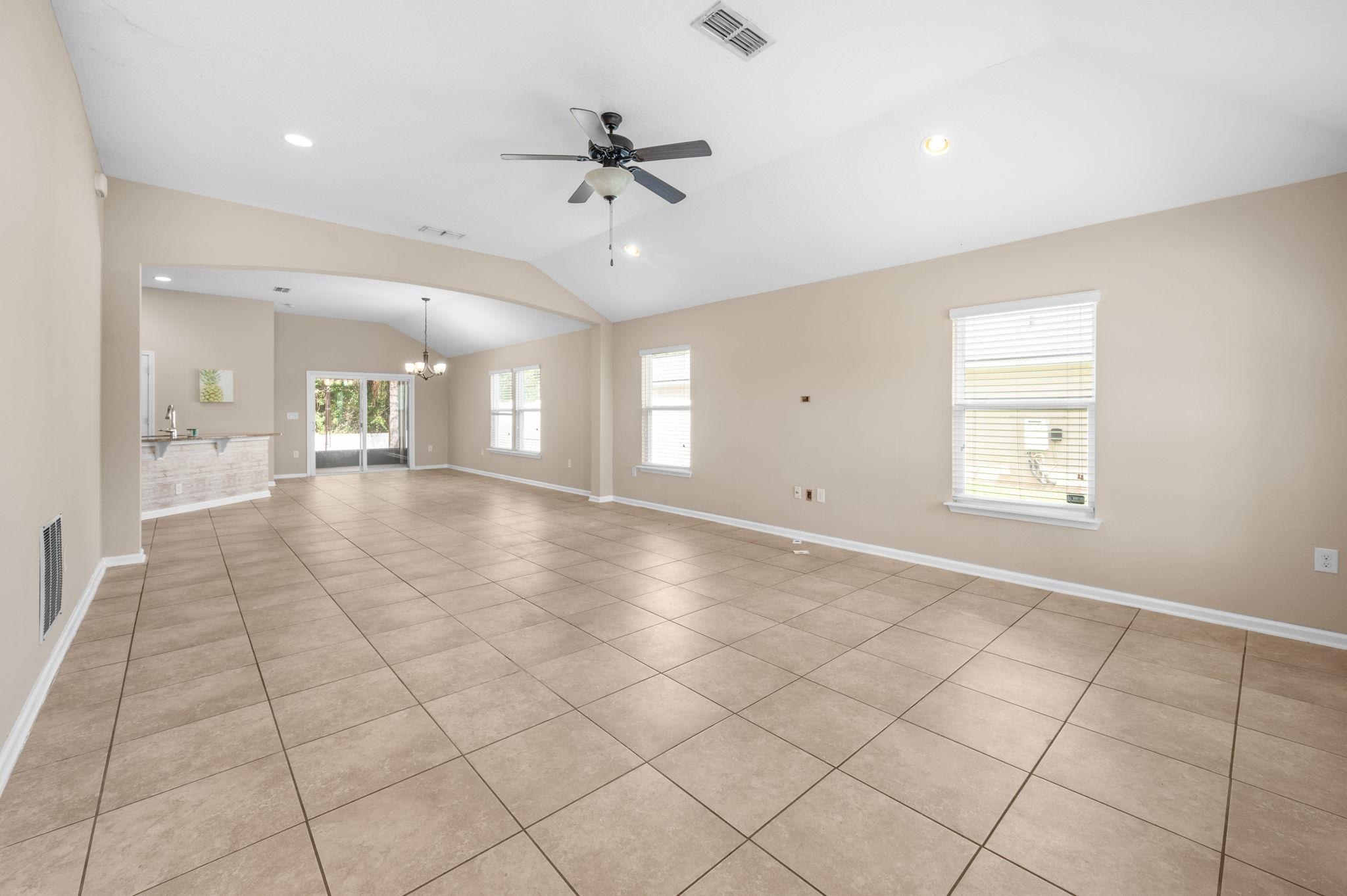 509 Deer Crossing Road St. Augustine, FL 32086 - Photo 7 of 54 a view of an empty room and a window
