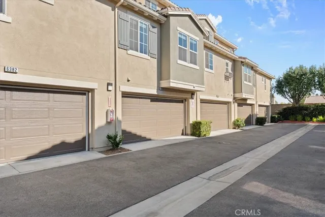 a view of a house with a street