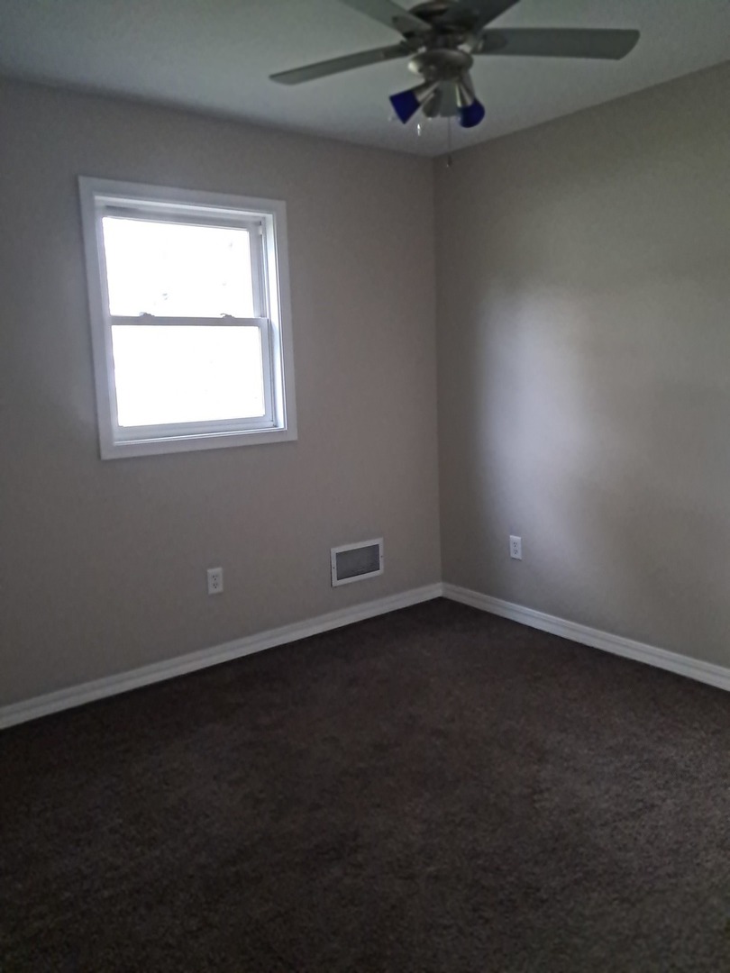 303 North Division Street Braidwood, IL 60408 - Photo 17 of 20 an empty room with a window