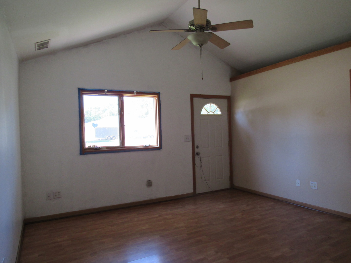 303 North Division Street Braidwood, IL 60408 - Photo 5 of 20 a view of an empty room with a window