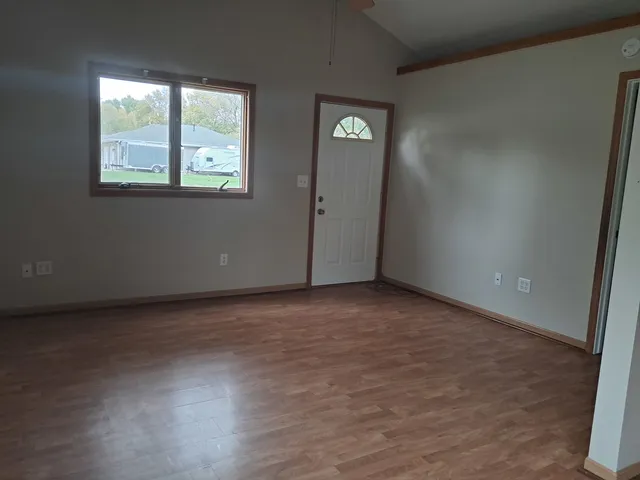 an empty room with windows