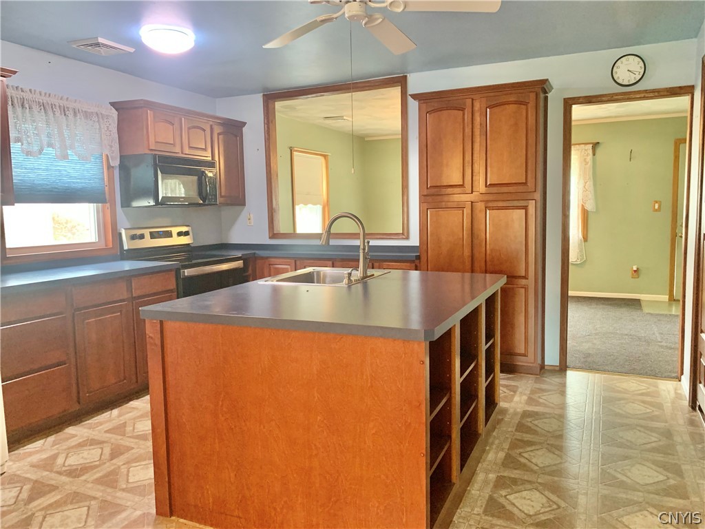 53 Pinecrest Road Whitestown, NY 13492 - Photo 10 of 33 Kitchen with large center island with built-in thr