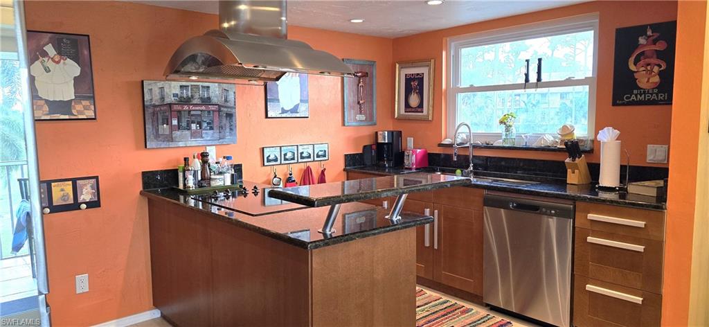 69 Georgetown Boulevard, Unit 69 Naples, FL 34112 - Photo 9 of 21 a living room with furniture and large windows