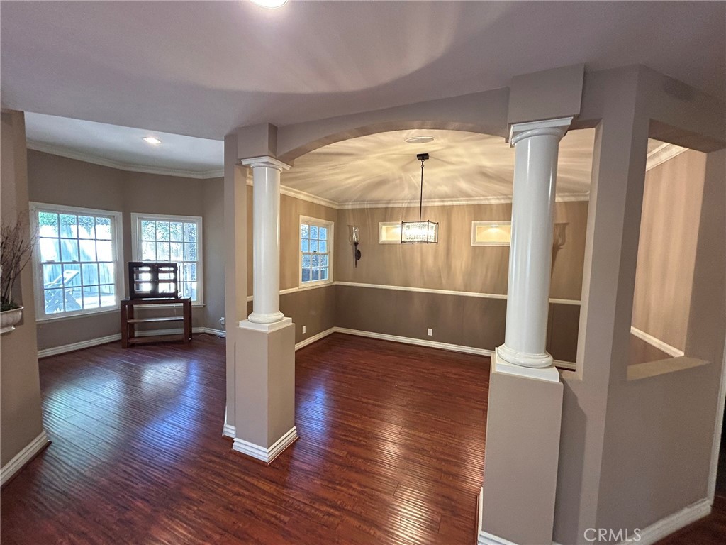 300 South Timken Road Anaheim, CA 92808 - Photo 10 of 40 a view of empty room with wooden floor and fan