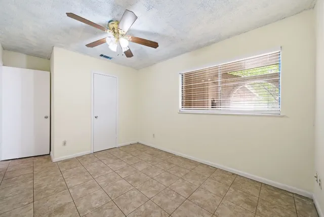 a view of yard with patio