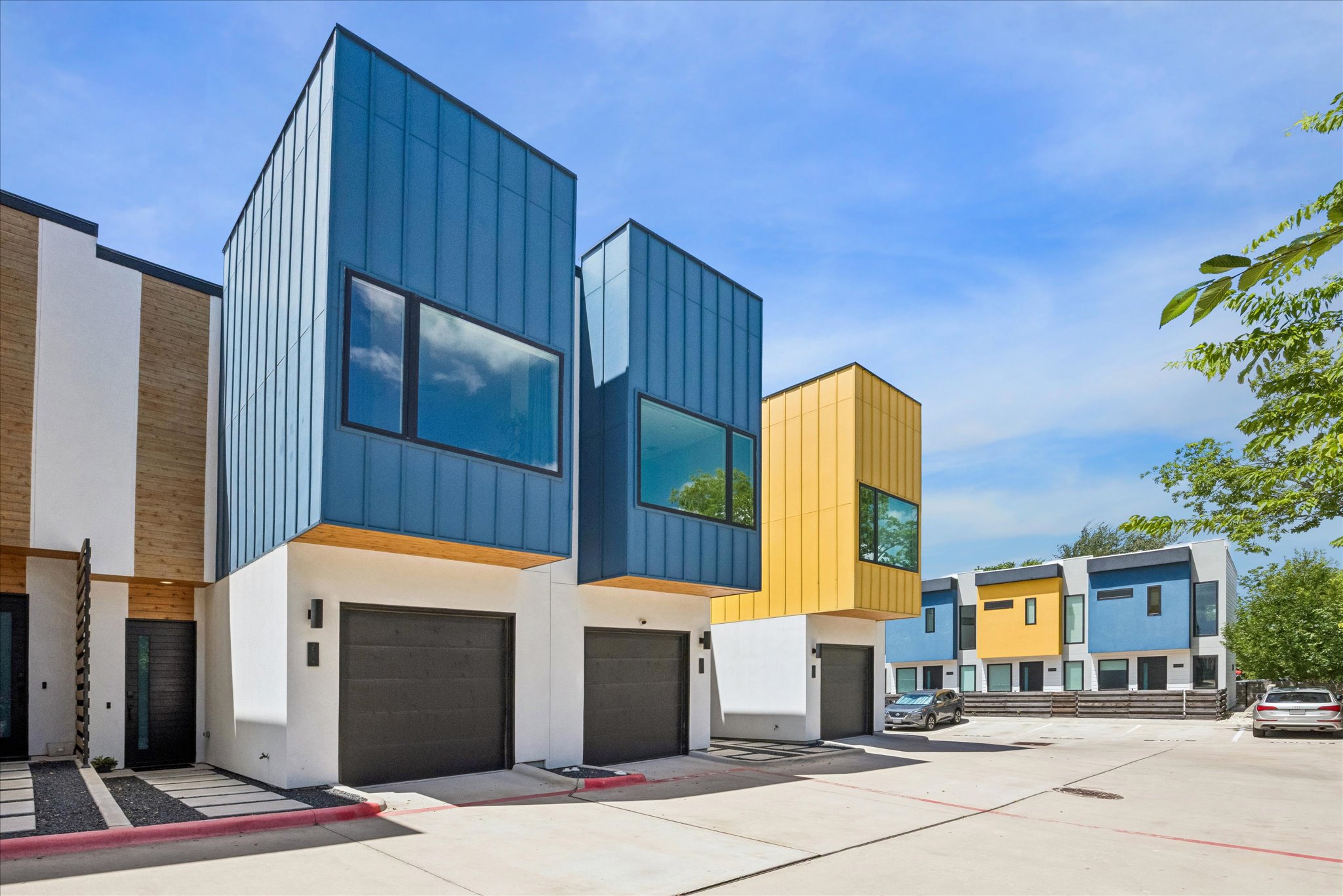 2108 Tillery Street, Unit 9 Austin, TX 78723 - Photo 24 of 25 Modern community. Unit 9 is the blue townhouse on the left