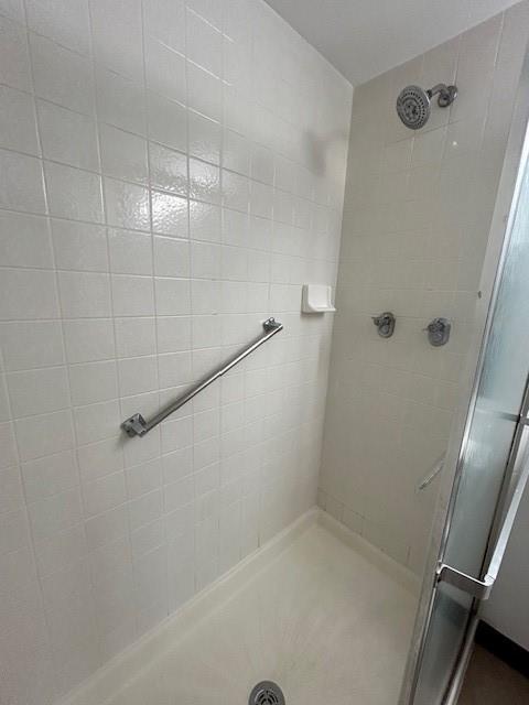 721 Sunny Pine Way, Unit G2 Greenacres, FL 33415 - Photo 30 of 34 a bathroom with a shower