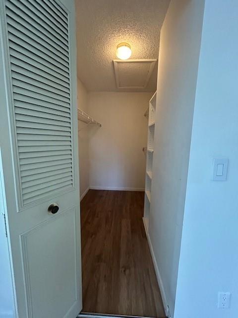 721 Sunny Pine Way, Unit G2 Greenacres, FL 33415 - Photo 31 of 34 a view of a hallway with wooden floor