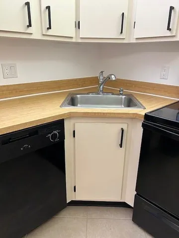 a close view of utility and kitchen sink