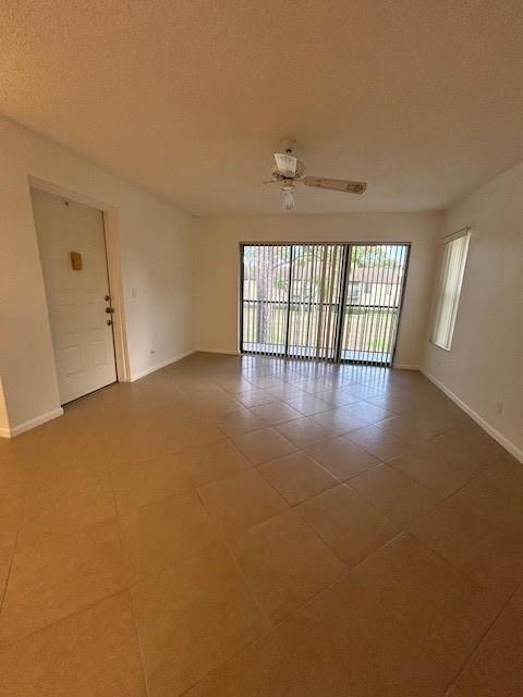 721 Sunny Pine Way, Unit G2 Greenacres, FL 33415 - Photo 8 of 34 an empty room with windows
