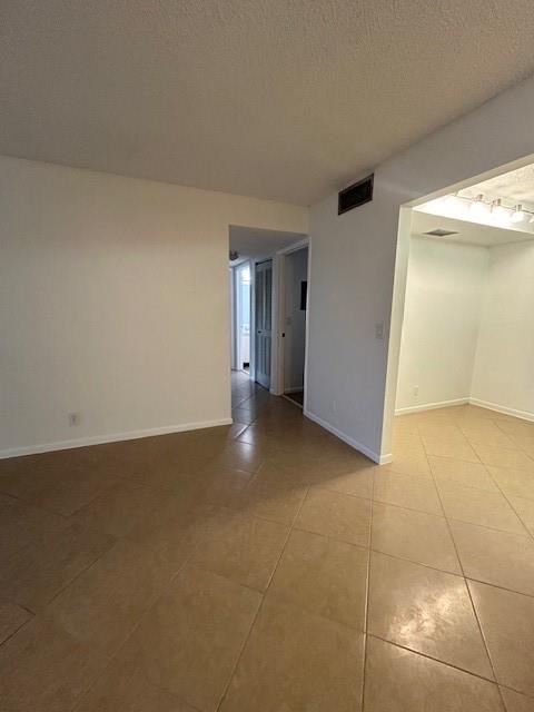 721 Sunny Pine Way, Unit G2 Greenacres, FL 33415 - Photo 10 of 34 a view of an empty room with a window