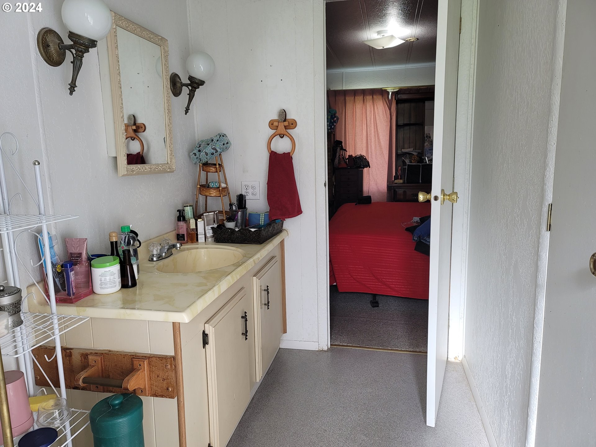 449 Evergreen Ridge Road Riddle, OR 97469 - Photo 14 of 21 a bathroom with a sink vanity and mirror